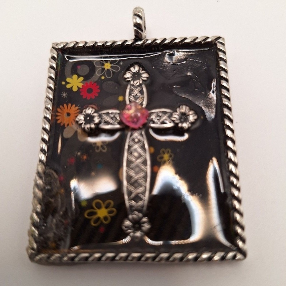 Cross pendant enamel flowers square black background rope trim in silver tone